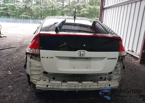 2010 Honda Insight Ex z USA, uszkodzony, nr VIN JHMZE2H76AS006234